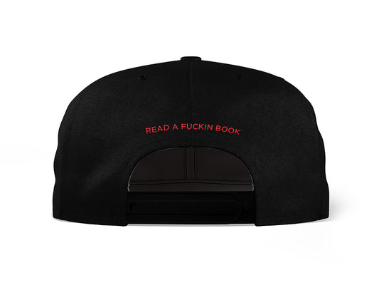 Image of the back of a black 5-panel snapback hat, embroidered with "READ A FUCKIN BOOK" in red text.