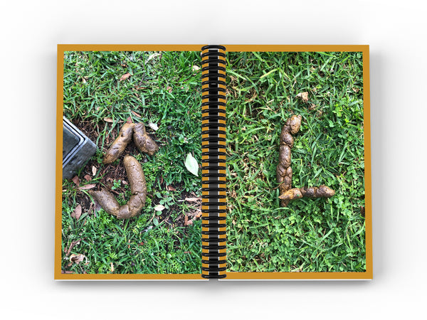 Image of an open book with coil binding down the center. Left page is an image of a J-shaped dog excrement on grass. Right page is dog excrement shaped like the letter “L” on dirt.