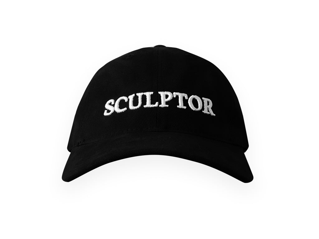 Image of black hat with SCULPTOR embroidered in white on front
