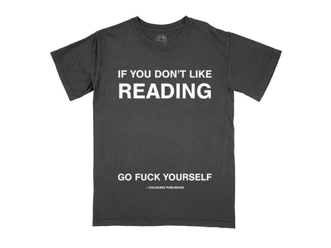 Image of a black t-shirt with white text that says "If you don't like reading go fuck yourself –  Coloured Publishing" printed on the front.