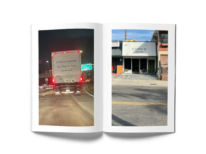 Image of a book open to a spread. On the left page is a photograph of a truck driving on a freeway and on the right page is a photograph of a building with the word "COOCH" painted on its front.