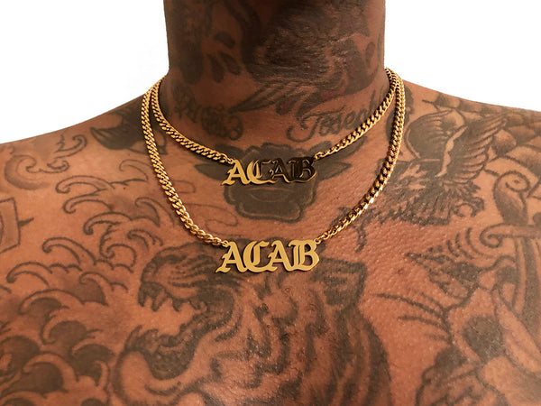 Image of Image of gold ACAB necklace with 16" chain and gold ACAB necklace with 20" chain on African-American model with tattoos