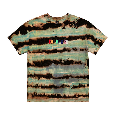 An image of a black t-shirt with green and beige stripes and "COLOURED" embroidered in rainbow colors.