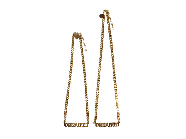 Image of gold "COLOURED" necklaces on white background, one with a shorter chain and one with a longer chain.