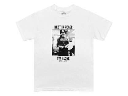 An image of a white t-shirt with a black and white photograph of Eva Hesse with text that reads "REST IN PEACE EVA HESSE 1936-1970"  