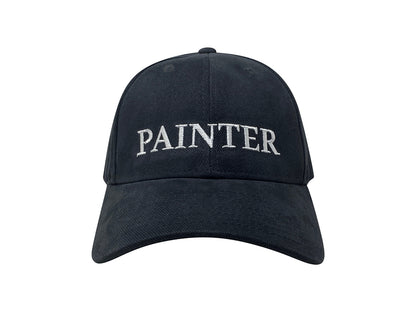 An image of the front of a black hat with "PAINTER" embroidered in white.