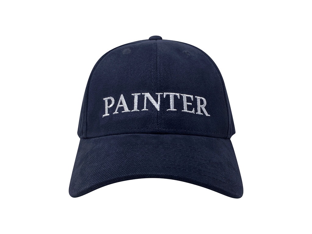 An image of the front of a navy hat with "PAINTER" embroidered in white.