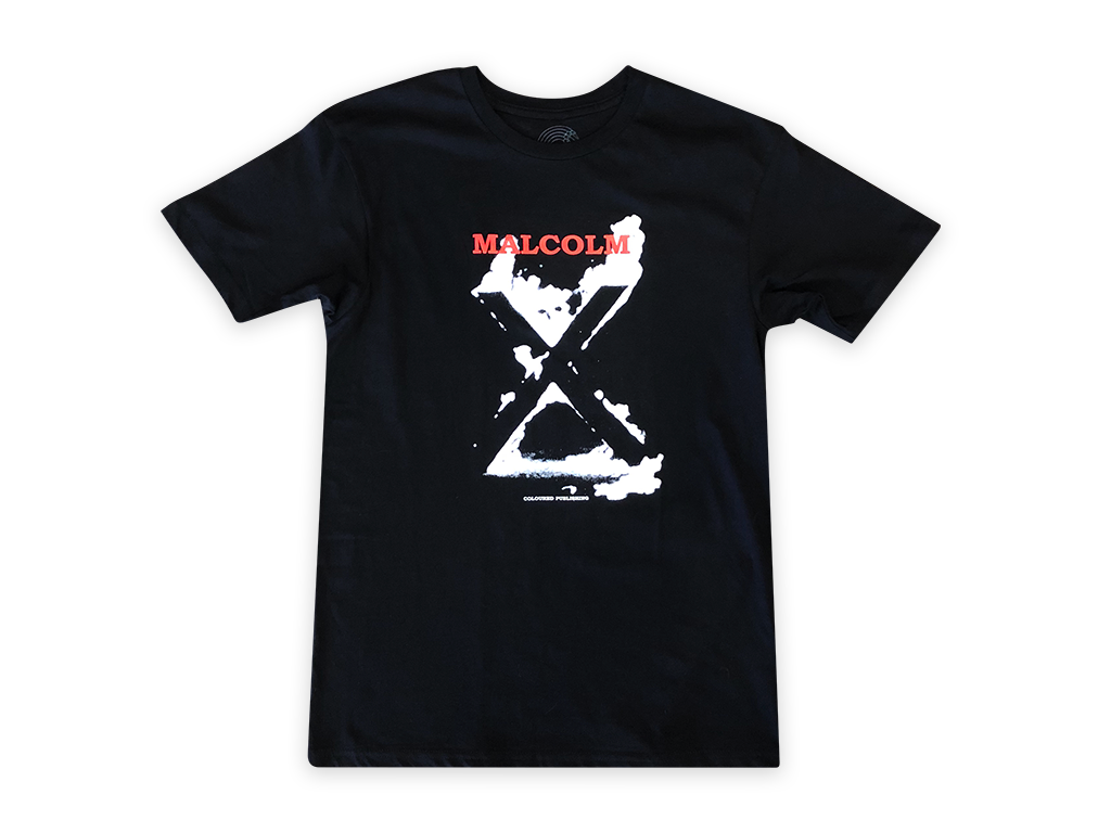 Photo of a t-shirt with "Malcolm" and an image of a burning X.