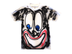 Photo of an airbrushed t-shirt with a smiley face by artist Devin Troy Strother.